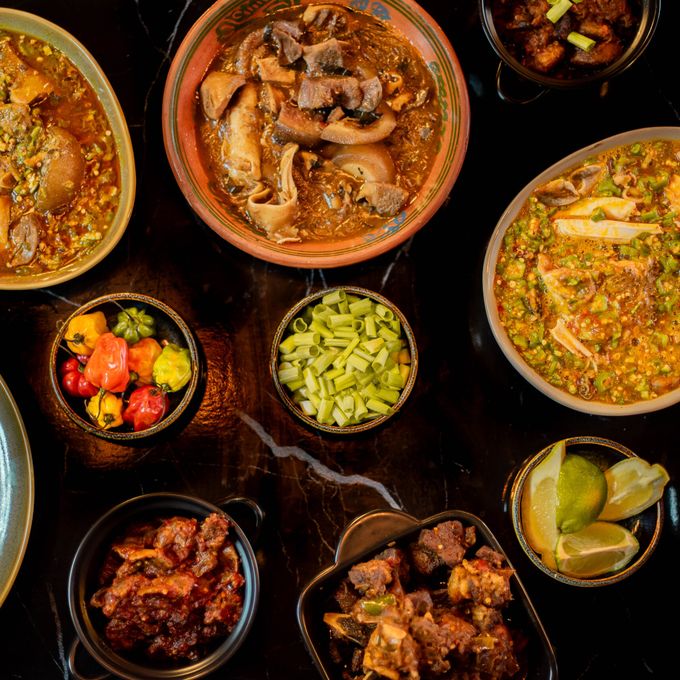A table of assorted meats and sides